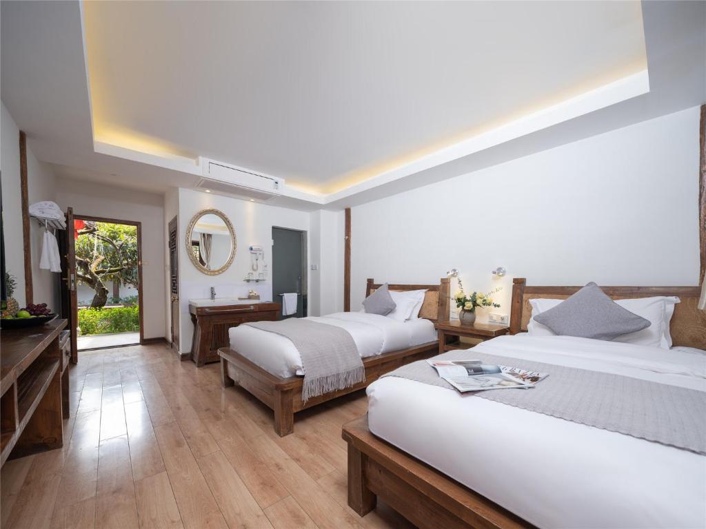 Lijiang Lize Graceland Merry Inn - Khách sạn Lệ Giang cổ Trấn  02